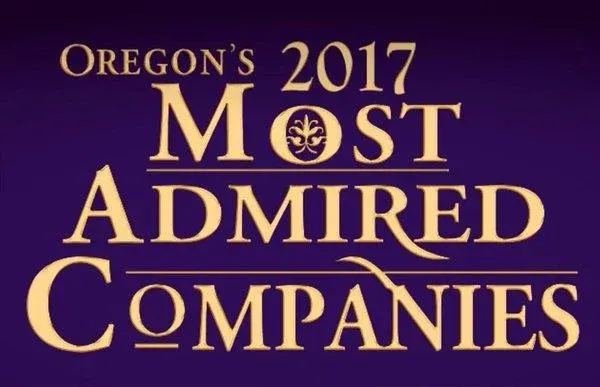 Gold text on purple background reading "Oregon's 2017 Most Admired Companies" award designation