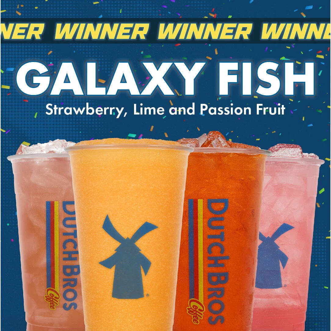 Four colorful Dutch Bros drinks featuring Galaxy Fish flavor with strawberry, lime and passion fruit on blue background.