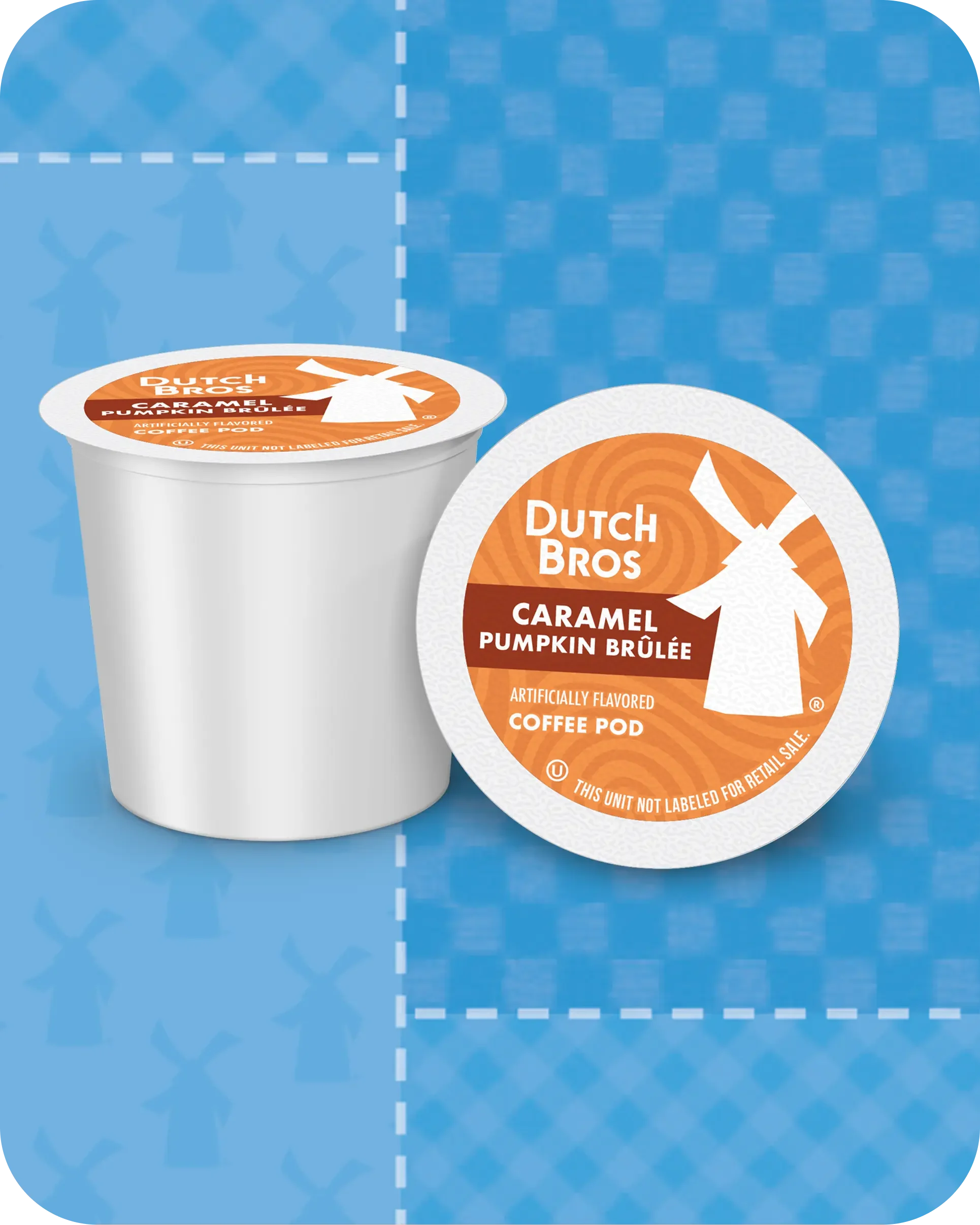 Dutch Bros Caramel Pumpkin Brûlée coffee pod with orange and brown label featuring a windmill logo, on a blue background.