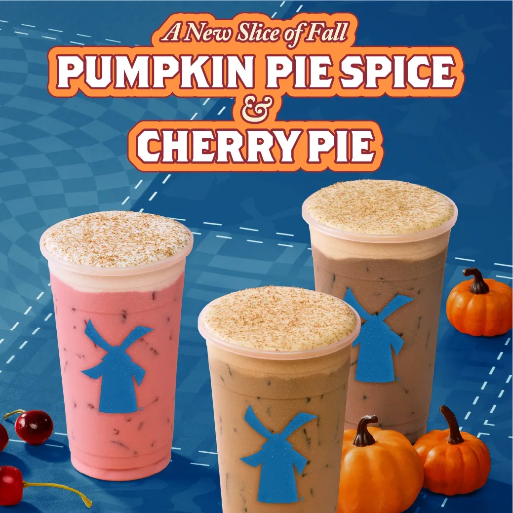 Three Dutch Bros fall drinks: a pink Cherry Pie and two brown Pumpkin Pie Spice beverages, with pumpkins and cherries on a blue background.