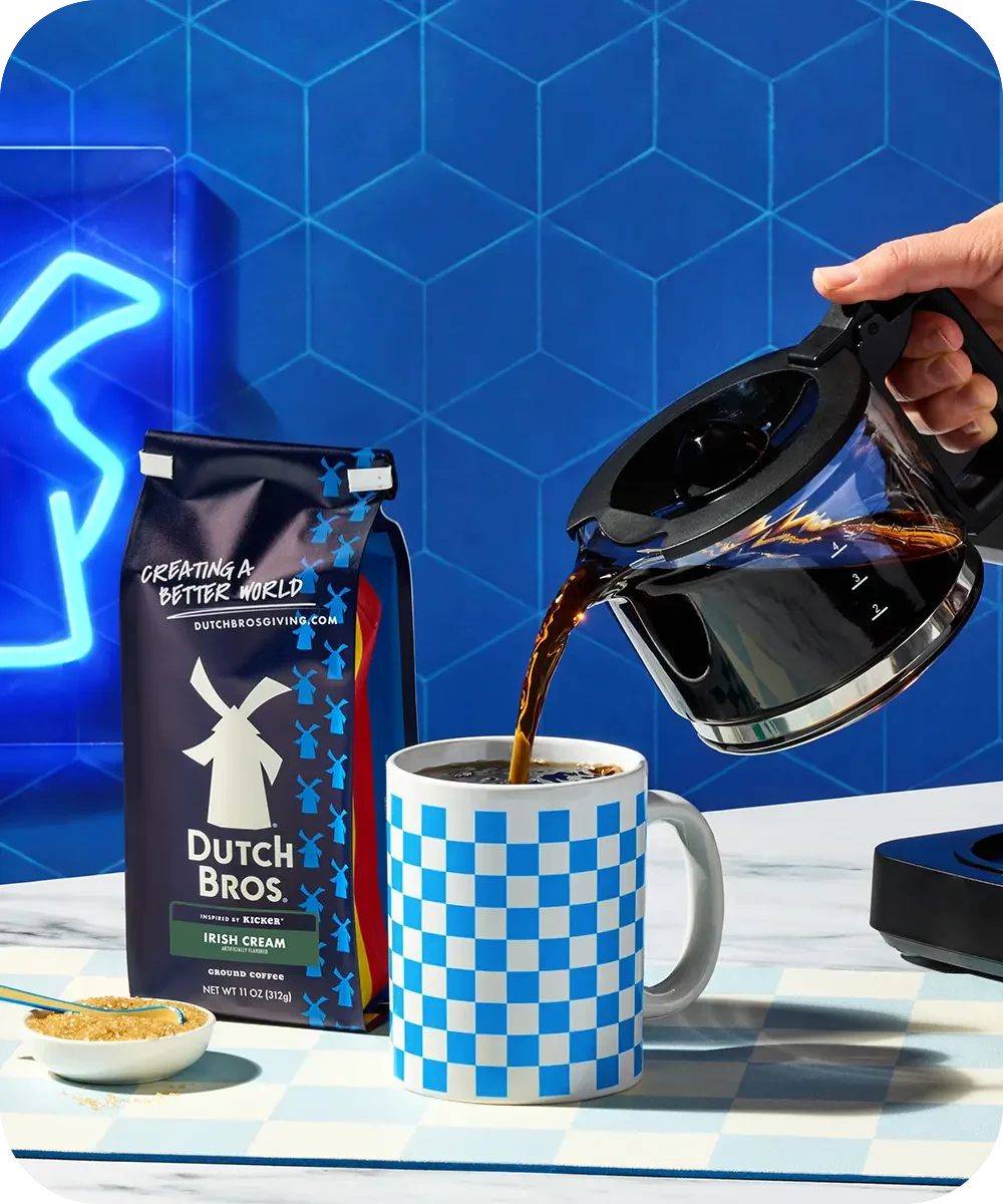 dutch bros irish cream coffee with coffee being poured into cup