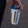 A Dutch Bros cup being help by a customer