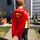 a picture of a youngster with a superman cape