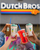 A group of customers cheers with their Dutch Bros cups outside a stand