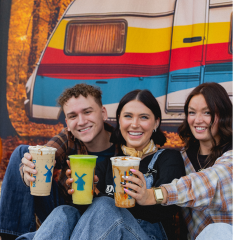 In Fall We Wear Flannel - Trio of People Holding Drinks