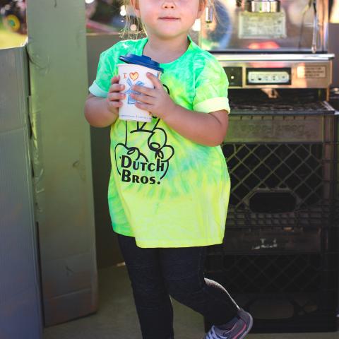 A young Dutch Bros fan poses with her drink