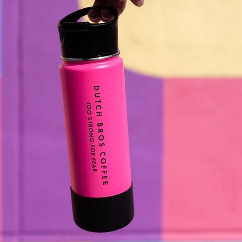 A pink colored insulated bottle is shown 