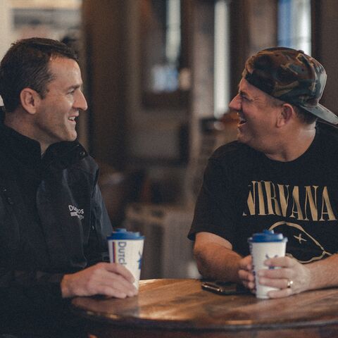 New Dutch Bros president Joth Ricci is shown talking with founder Travis Boersma